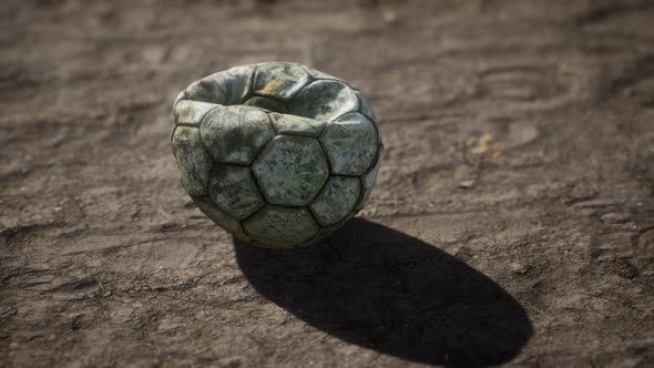 Old Soccer Ball the Cement Floor alt