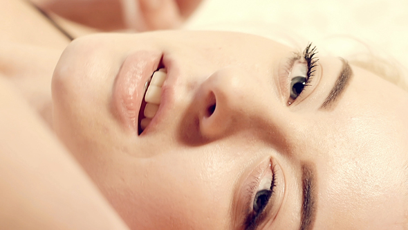 Sexy Woman On The Bed Portrait