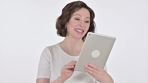 Online Video Chat on Tablet By Old Woman White Background