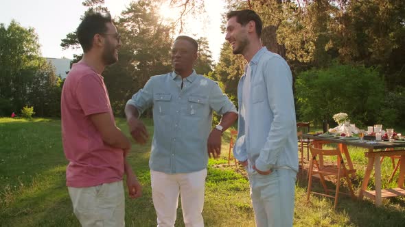 Three Young Men Chatting