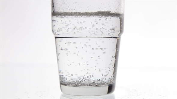 Fizzy Tablet In Glass Of Water Isolated