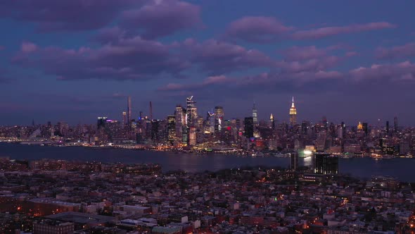 Urban Skyline of Midtown Manhattan and Hoboken at Night