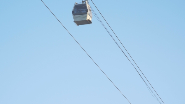 A Cable-Car With a Blue Background