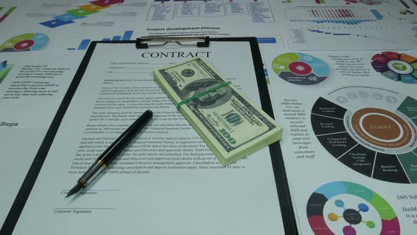 Business Contract And Dollars In The Office Of A Modern Company