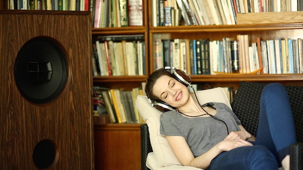 Beautiful Girl Listening To Music