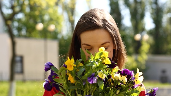 Gorgeous Woman With Spring Flowers