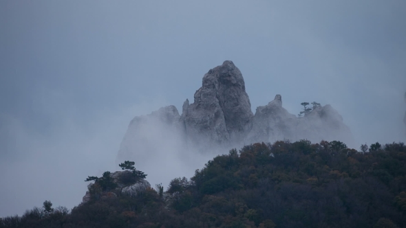 Fog Hovering Around The Rocks