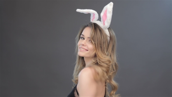 Girl Spins With Bunny Ears On Head