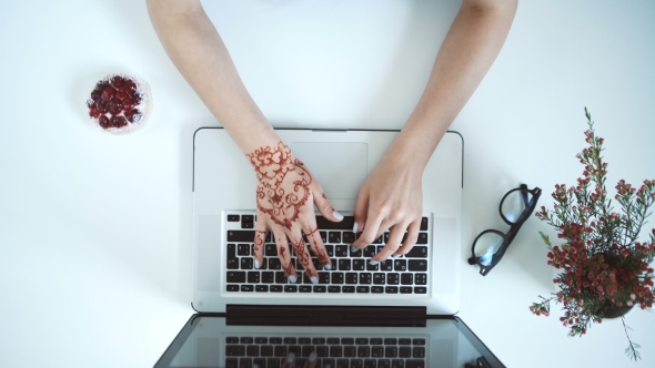 Young Woman Using Laptop Computer