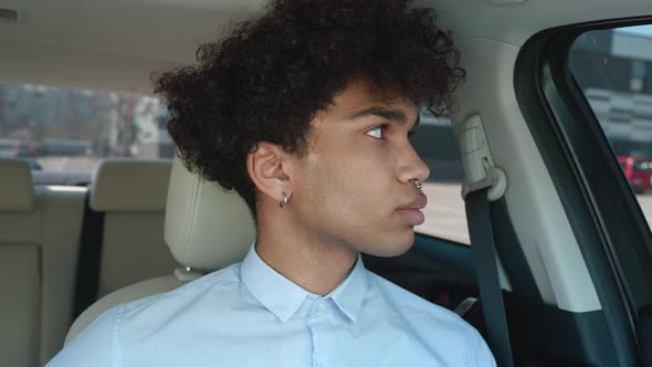 African Driver Portrait at Car Interior