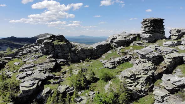 Drone Flight Around Huge Rock at Summer