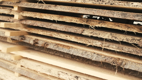 Wood Stacked Neatly On The Shelves