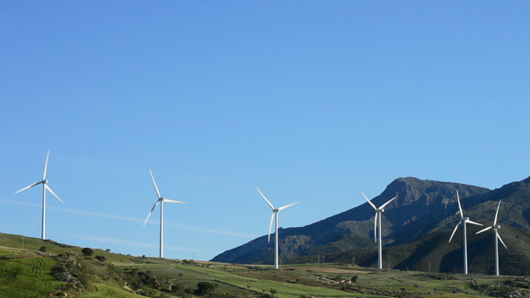 Wind Turbines Energy in the Mountains at Sunny Day