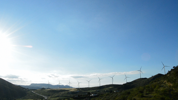 Wind Turbines Energy Moving at Sunset