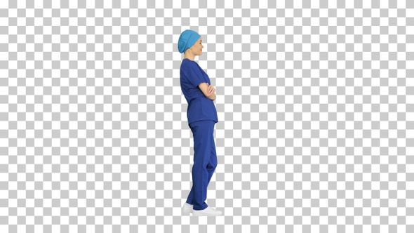 Female nurse or surgeon wearing blue suit, Alpha Channel