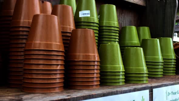 Environmentally-friendly bamboo fibre plant pots in a garden centre.