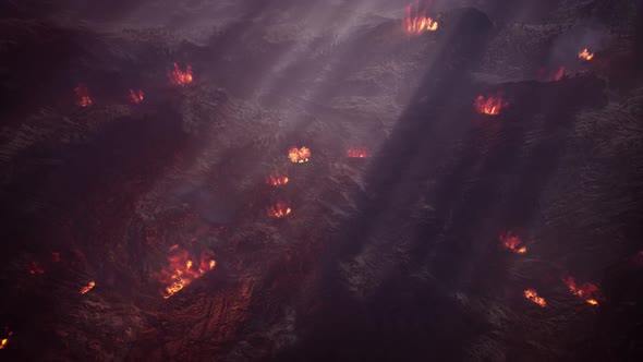 Wildfire Burns a High Mountain Forest Aerial View 04