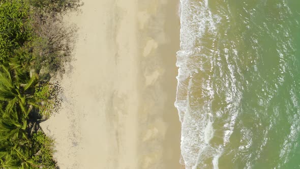 Aerial, Gorgeous View On The Ocean Waves And Tropical Beach, Top Down View 