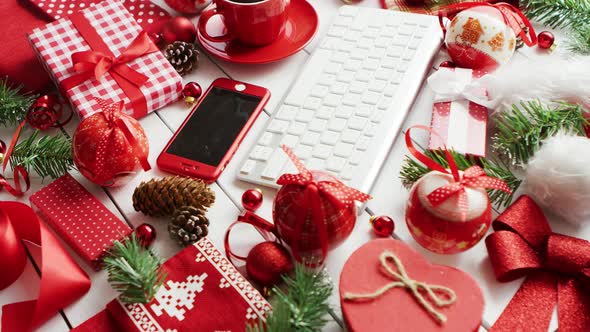 Christmas Symbols Around Devices and Hot Beverage