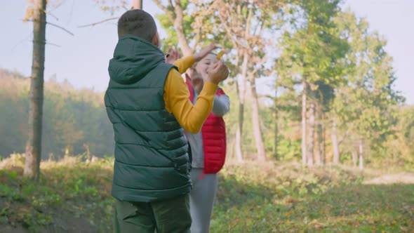 Children Play in the Autumn Forest