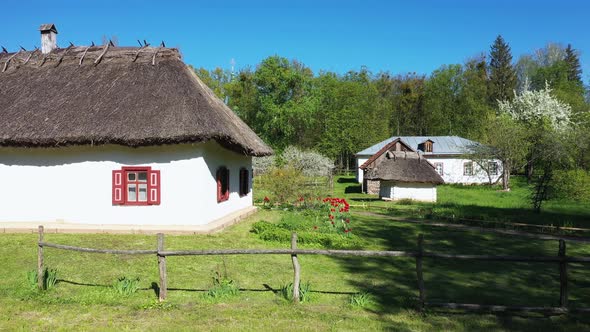 Old Ukrainian House with Straw Roof Aerial View