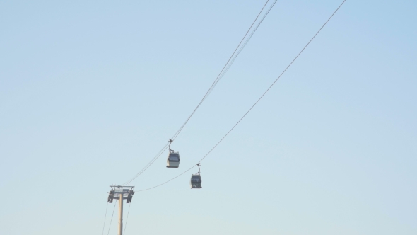 The Cable Car Public Transport. Cable Cars On Blue Sky Background.