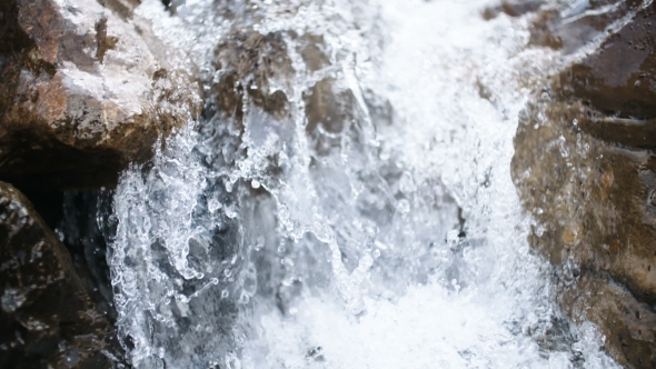 Pure Fresh Water Waterfall In Forest In The Mountains