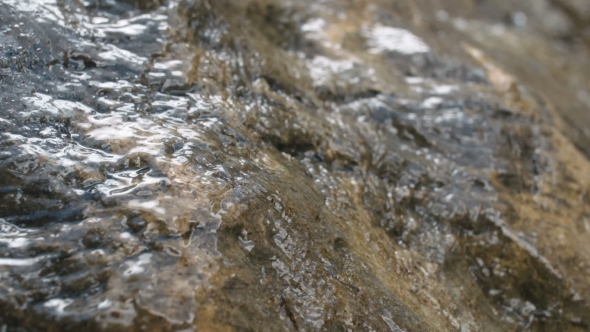 Pure Fresh Water Waterfall In Forest In The Mountains