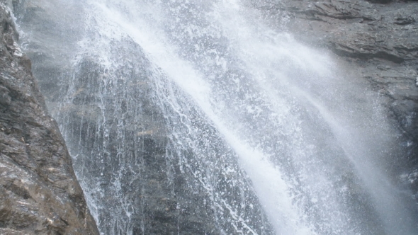 Pure Fresh Water Waterfall In Forest In The Mountains