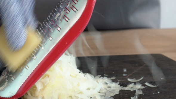  Parmesan Cheese Being Grated