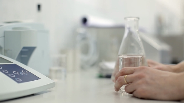 A Technician Is Checking The Quality Of Water