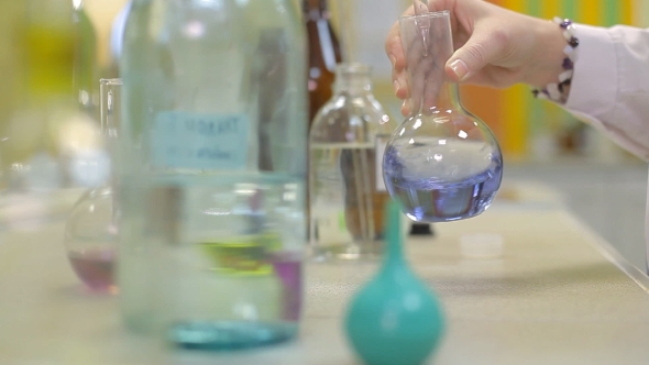 A Technician is Checking the Quality of Water