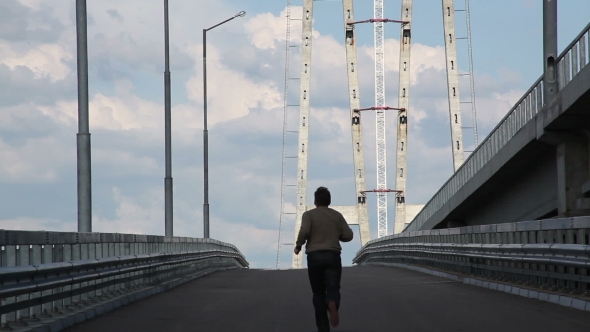 The Man, Thick, Running Along The Road Into The Distance.