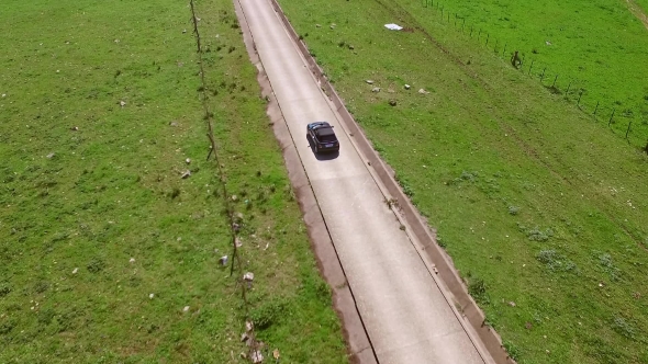 Aerial View Of The Road With Driving Car