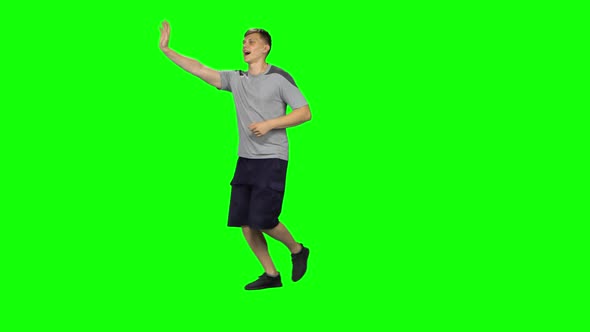 Guy Runs and Waves His Hand Stand, Chroma Key