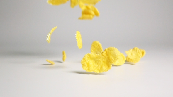 Cornflakes Fall On White Surface