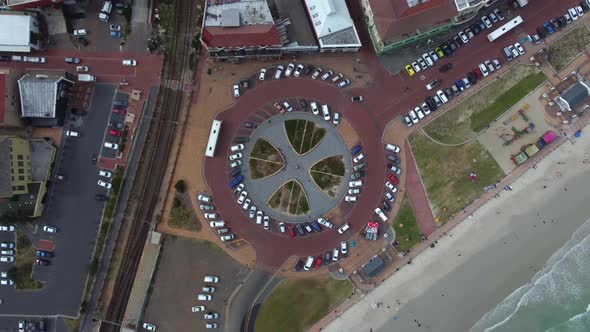 Birds eye drone shot of Muizenberg, Cape Town - drone is ascending over the famous Surfers Corner. S