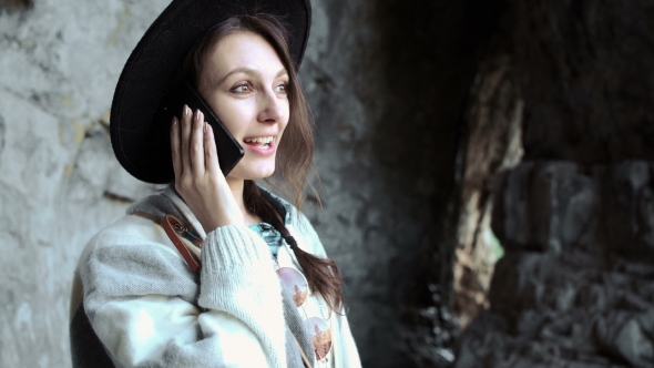 Mountain Trekking - European Woman Talking On a Walkie-talkie