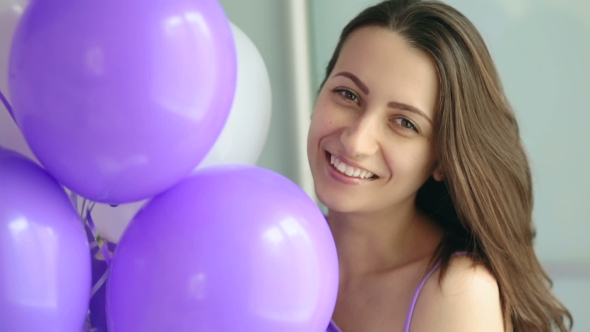 Smiling Woman With Balloons