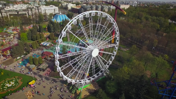 Aerial View Of Ferris Wheel In Amusement Park