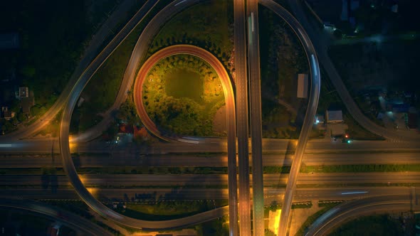 4K : Time lapse Aerial view and top view of traffic on city. Expressway with car lots