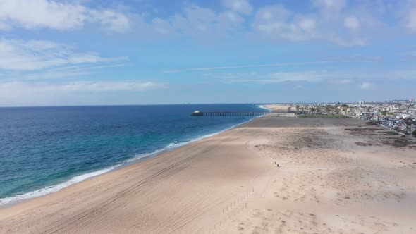 panoramic aerial view of Newport beach, Orange county, CA, USA. large sand strip and pier at backgro