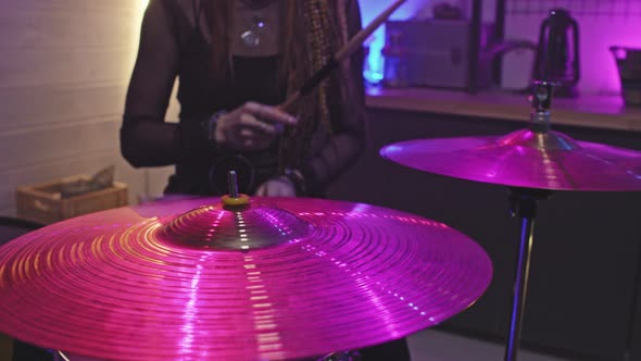 Female Drummer Performing Music At Concert