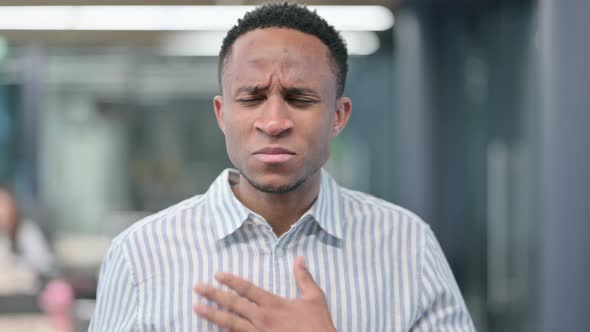 Young African Businessman Having Coughing