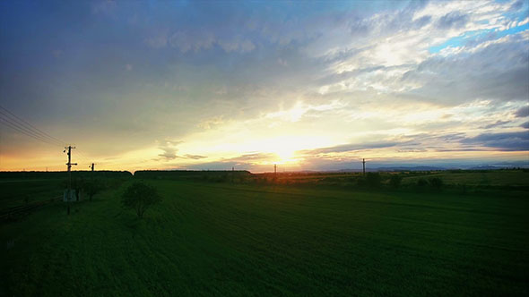 Sunset Over A Field Of Wheat