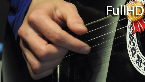 Playing Six-String Acoustic Guitar Big Hands on
