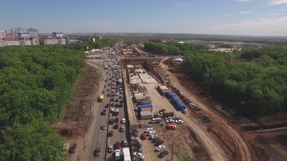 Copter Flies Over Traffic Jam And Building Of Road Junction