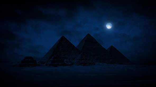 Pyramids At Night With Moon Above