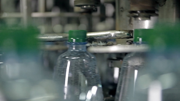 Manufacturing And Filling Plastic Bottles With Drinking Water