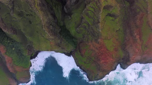 Scenic Aerial View Over the Beautiful Coastal Cliffs and Blue Ocean Waves of Hawaii